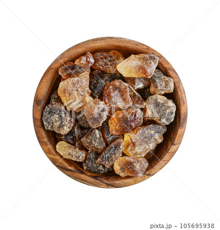 Large caramelized sugar in wooden bowl Large caramelized sugar in wooden bowl 105695938