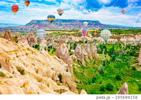 Cappadocia, Turkiye - July 06, 2023-Air balloons in Cappadocia - Valley of Love, Turkiye. 105699158