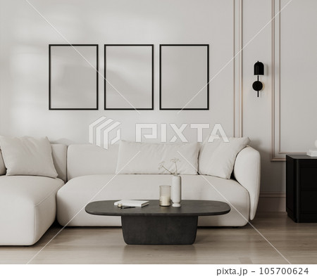 poster frames mock up in modern living room with white sofa and wall with moldings, black and white french style, 3d render 105700624