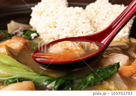 Seafood Fried Glutinous Rice Soup with Seafood and Vegetables and Fried Glutinous Rice Seafood Fried Glutinous Rice Soup with Seafood and Vegetables and Fried Glutinous Rice 105701783