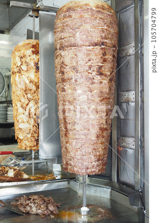 rotating traditional gyros meat close up rotating traditional gyros meat close up 105704799