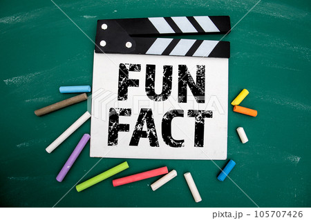 Fun Fact Concept. Colored pieces of chalk on a green chalkboard background Fun Fact Concept. Colored pieces of chalk on a green chalkboard background 105707426