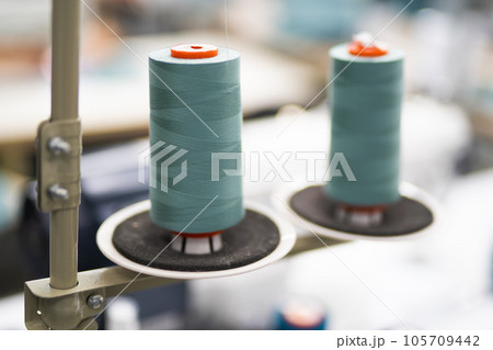 close-up of skeins of thread at an industrial sewing factory for tailoring clothes 105709442