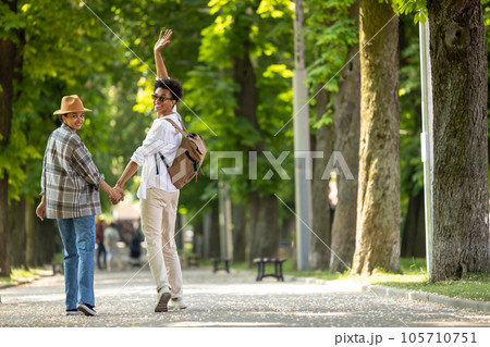 Cute couple having a walk and feeling wonderful together 105710751