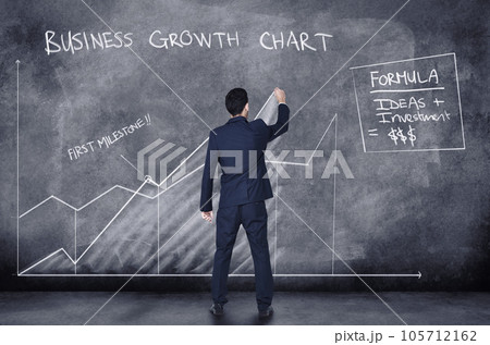 Finance businessman writing on CGI graphic chart while analyzing, planning and working on company budget marketing stats or data on dark background. Rear of accountant with analysis of career growth Finance businessman writing on CGI graphic chart while analyzing, planning and working on company budget marketing stats or data on dark background. Rear of accountant with analysis of career growth 105712162