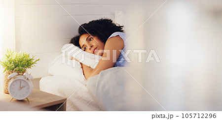 Woman, bed and insomnia or restless for sleep or rest in home bedroom with fatigue or stress. Female person frustrated with sleeping problem, depression or disorder while dreaming or sleepless 105712296