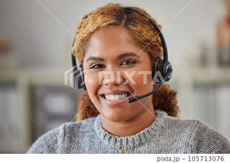 African female call center agent smiling and happy to help in her office at work. Portrait of a young woman customer service employee looking excited and ready to support clients in her workplace 105713076