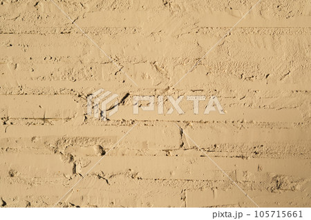 Texture of white painted brick wall close-up with sun. Texture of white painted brick wall close-up with sun. 105715661
