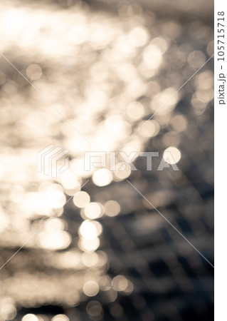 Beautiful background of water in the rays of the setting sun. Beautiful background of water in the rays of the setting sun. 105715718