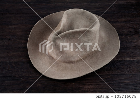 Old west hat on table. Top view. Old west hat on table. Top view. 105716078