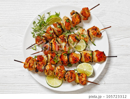 chicken souvlaki with thyme and lime on plate chicken souvlaki with thyme and lime on plate 105723312