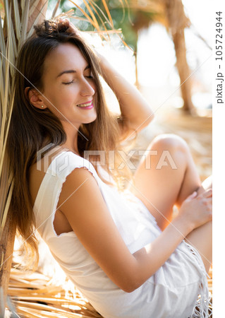 beautiful sexy girl alone in the jungle among leaves and trees. beautiful sexy girl alone in the jungle among leaves and trees. 105724944