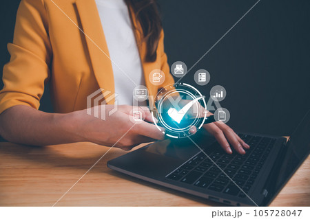 Businesswoman operating with quality assurance, guarantee, standards, ISO certification, standardization, top service, top quality service. Guarantee Standards quality control certification concept. 105728047