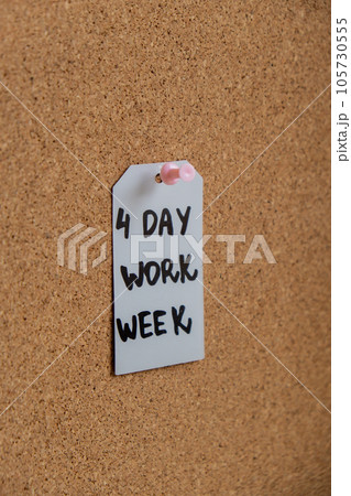 4 day work week text on paper note pinned to desk four day working week concept. Modern approach doing business short workweek. Effectiveness of employees. Productivity and efficiency 105730555