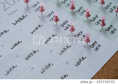 4 day work week printed calendar with pink pins on three days off in week weekend days four day working week concept. Modern approach doing business short workweek. Effectiveness of employees 4 day work week printed calendar with pink pins on three days off in week weekend days four day working week concept. Modern approach doing business short workweek. Effectiveness of employees 105730591