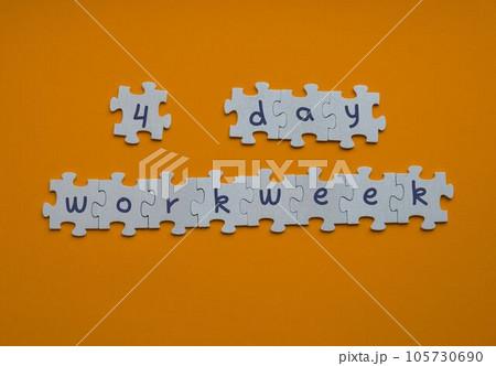 4 day work week symbol on puzzles four day working week concept. Modern approach doing business short workweek. Effectiveness of employees. Productivity and efficiency 105730690