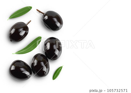 Black olives with leaves isolated on a white background with full depth of field. Top view with copy space for your text. Flat lay 105732571