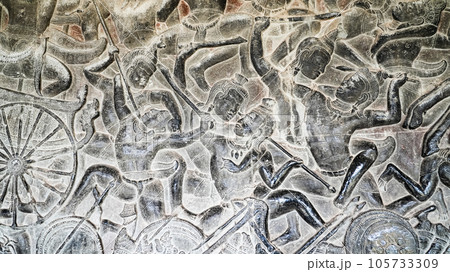 Wall carving of Khmer Culture in Ancient ruins Angkor Wat temple - famous Cambodian landmark. Siem Reap, Cambodia. 105733309