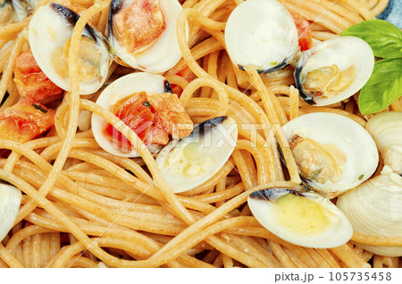 Dish of spaghetti with clams, macro. Dish of spaghetti with clams, macro. 105735458