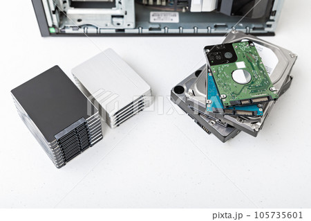 Closed-up view of hard disk drives with PC in the background Closed-up view of hard disk drives with PC in the background 105735601