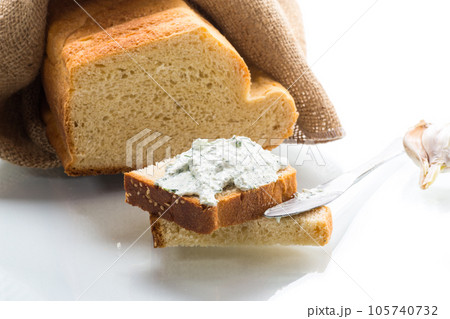 homemade salted curd spread with herbs and garlic homemade salted curd spread with herbs and garlic 105740732