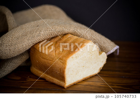 baked homemade bread from a bread machine baked homemade bread from a bread machine 105740733