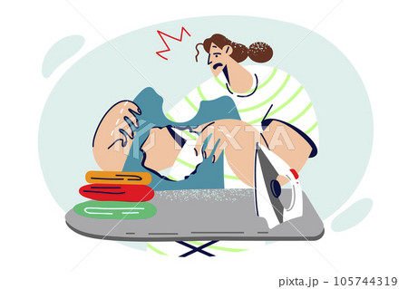 Housewife woman ironing clothes burned hole and gets upset without understanding cause mistake 105744319