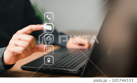 Client use a computer laptop with a virtual screen for apps phones, email, addresses, chat, and map icons. Customer service support hotline contacts us with the people connection technology concept. 105746555