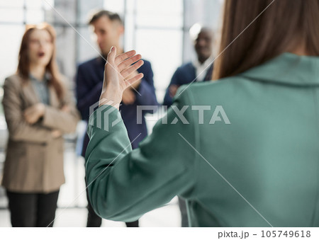 executive manager employer introducing welcoming newcomer to workmates. executive manager employer introducing welcoming newcomer to workmates. 105749618