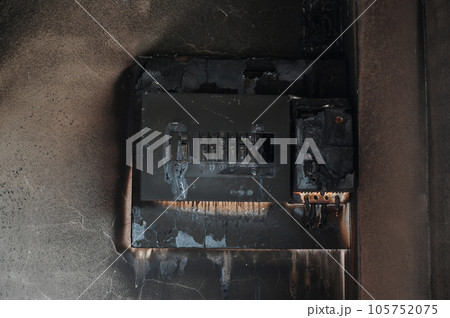 switchboard electricty burn on brick wall texture background switchboard electricty burn on brick wall texture background 105752075