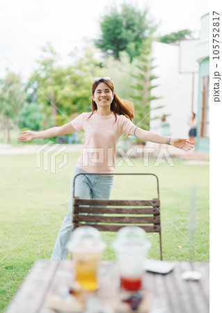 Happy woman with Dessert in cafe, young Asian girl smiling during eating cake and drinking ice beverage at home 105752817