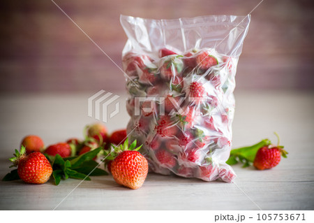 frozen fresh strawberries in a vacuum bag frozen fresh strawberries in a vacuum bag 105753671