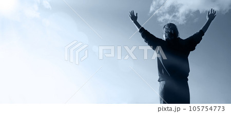 Happy girl pray to God 105754773