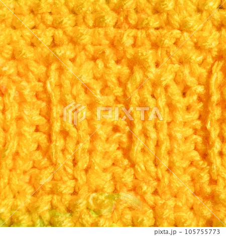 Handmade knitted fabric yellow wool background texture Handmade knitted fabric yellow wool background texture 105755773