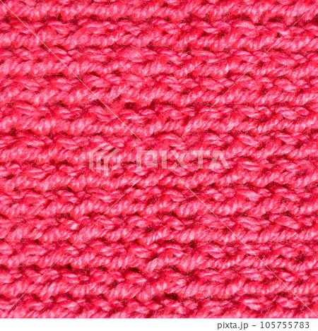 Handmade knitted fabric pink and red wool background texture Handmade knitted fabric pink and red wool background texture 105755783