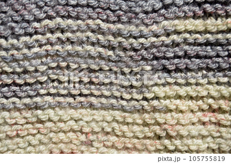 Handmade knitted fabric grey wool background texture Handmade knitted fabric grey wool background texture 105755819