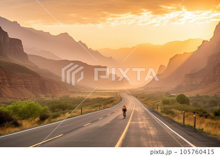 Cyclist riding bike 105760415