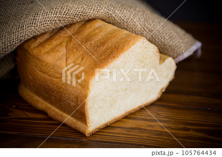 baked homemade bread from a bread machine baked homemade bread from a bread machine 105764434