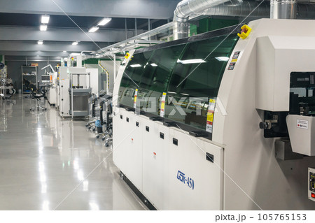 production line for printed circuit board manufacturing mounted in workshop 105765153