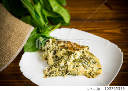 fried egg omelet with spring sorrel inside 105765586