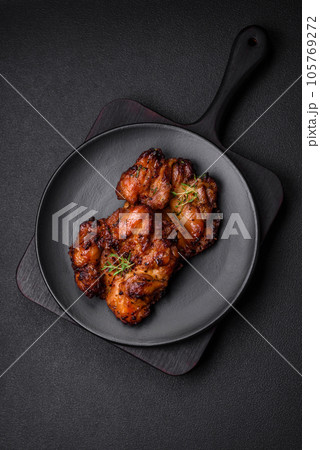 Delicious baked chicken meat with salt, spices and herbs 105769272