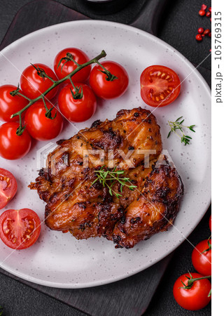 Delicious baked chicken meat with salt, spices and herbs 105769315