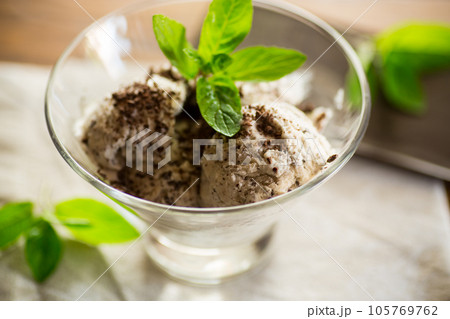 homemade ice cream with pieces of grated dark chocolate homemade ice cream with pieces of grated dark chocolate 105769762