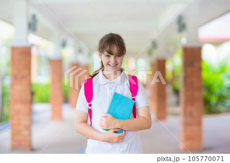 Kids back to school. Happy student with backpack. 105770071