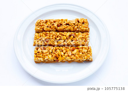 Peanuts butter chocolate bars on white 105775138
