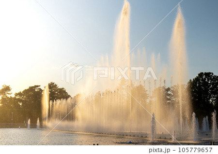 Multimedia Fountain at Centennial Hall, Wroclaw, Poland. The biggest fountain in Poland and one of the biggest in Europe. Sunlight water splashes. Beautiful architecture fountain  105779657