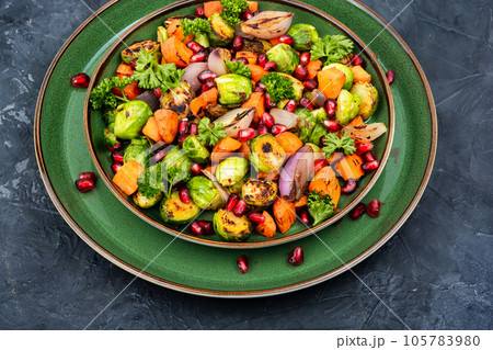 Warm salad with fried vegetables Warm salad with fried vegetables 105783980