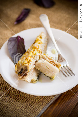 fish baked in the oven with spices, spices fish baked in the oven with spices, spices 105785416