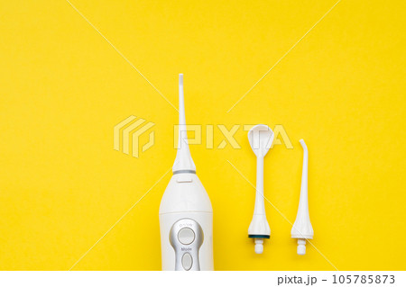 Mouth aerator on a yellow background with different nozzles. View from above 105785873