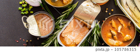 Open tin cans with canned fish Open tin cans with canned fish 105786315